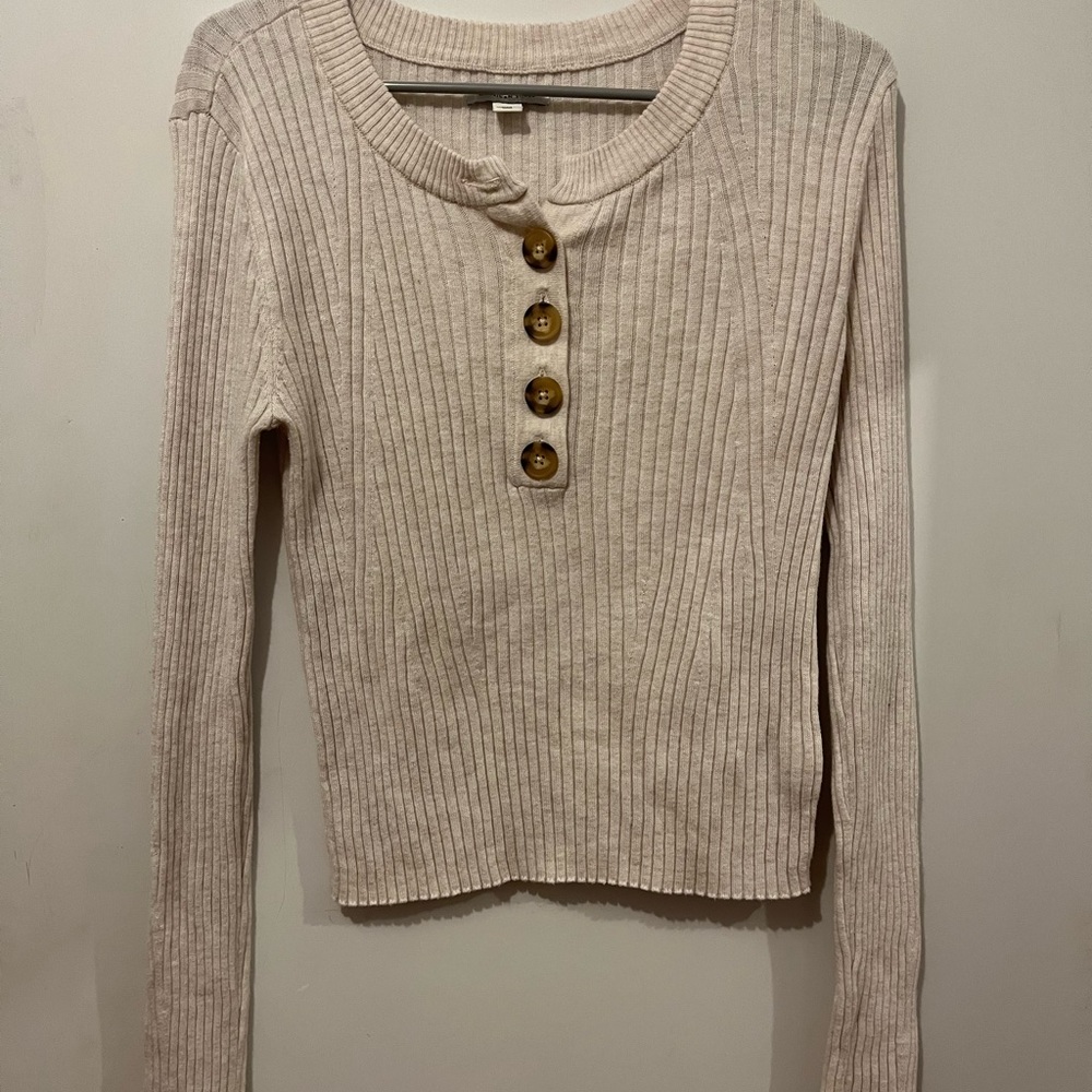Beige ribbed sweater with buttons